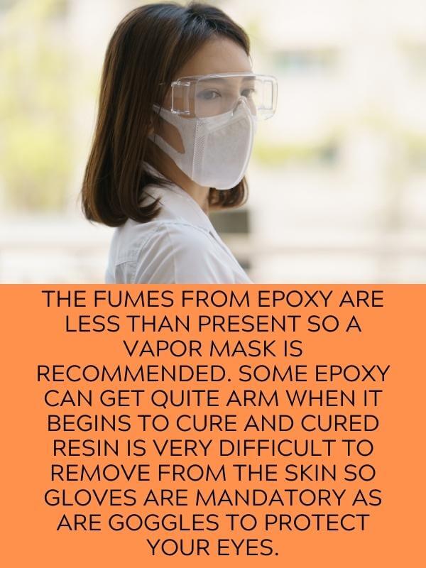 woman wearing safety glasses and mask